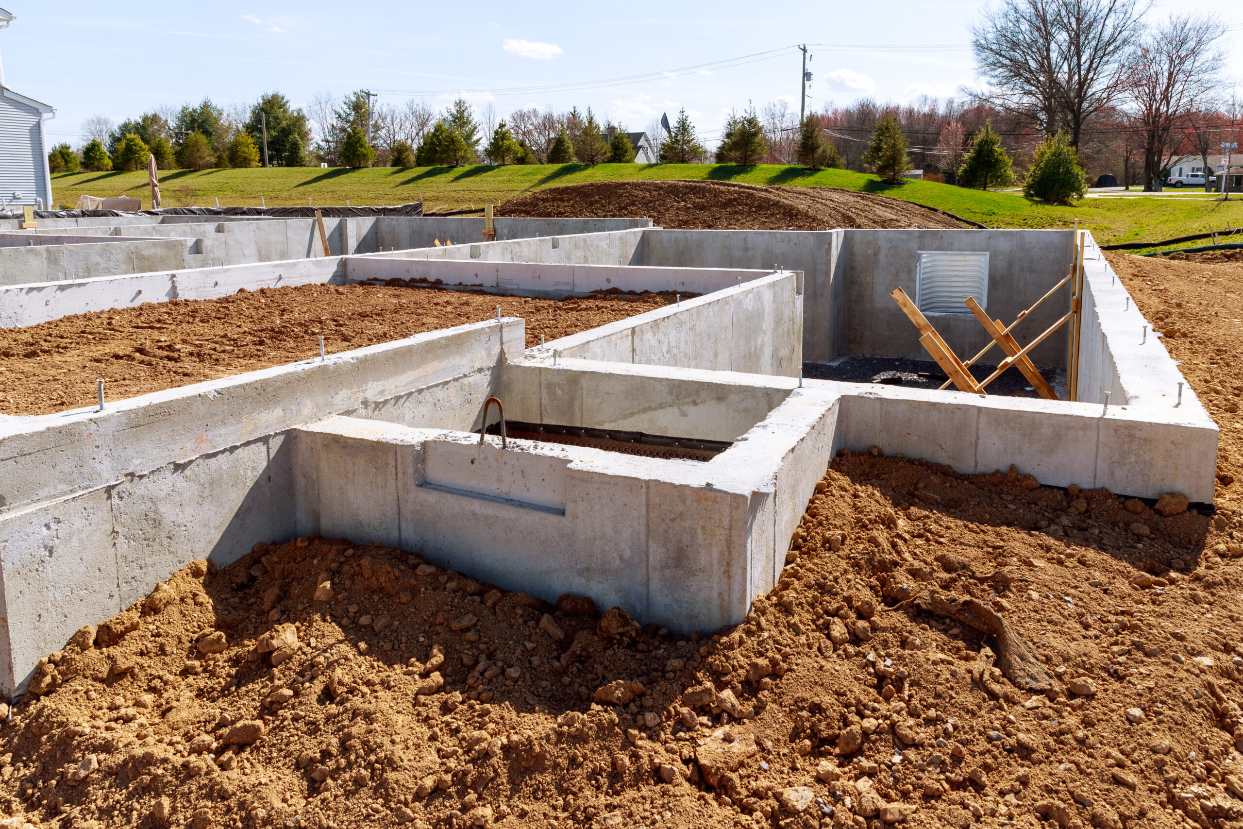 concrete foundation with reinforcement metal slab construction site process house building scaled